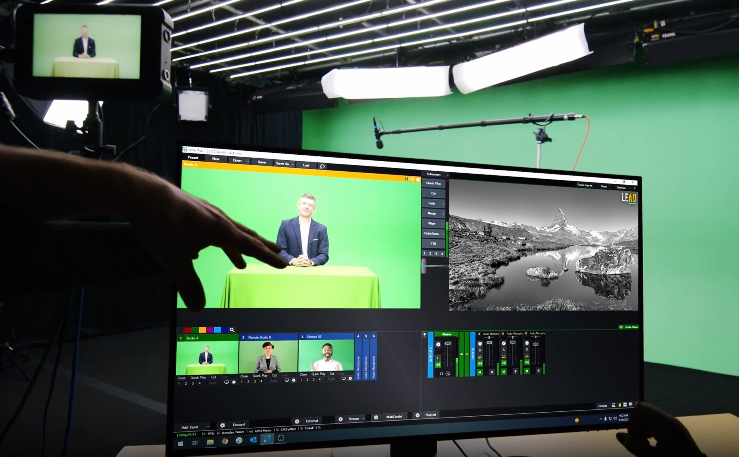 Behind-the-scenes during a virtual meeting livestream from Brella Production's green screen studio in Evanston, IL.