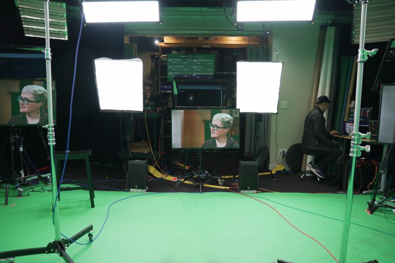 Behind the scenes view of patient interview in Brella Productions' Evanston, IL greenscreen studio.